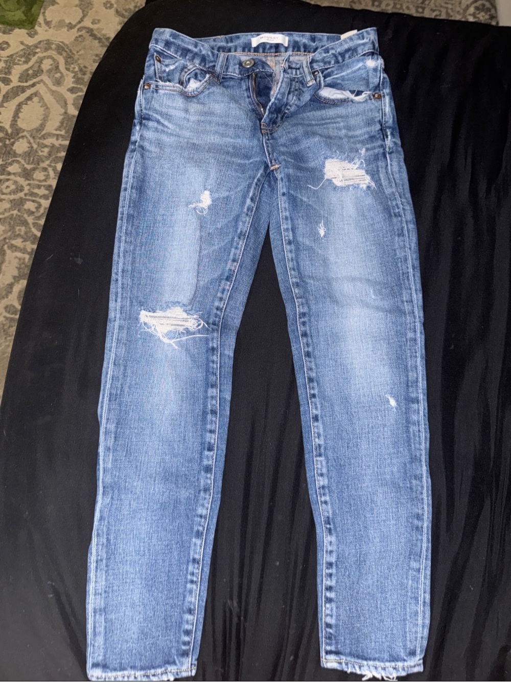 Distressed Light Blue Denim Jeans